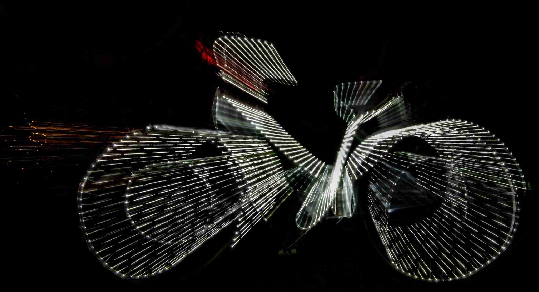 2nd Place  Val Bormanis Spinning Wheels -  January Holiday Light Photography